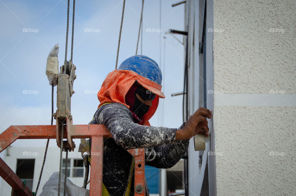 laborer painting