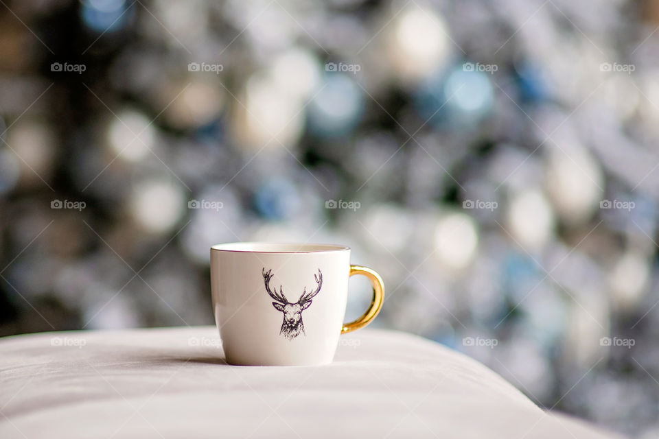 cup of coffee in a cozy festive Christmas atmosphere