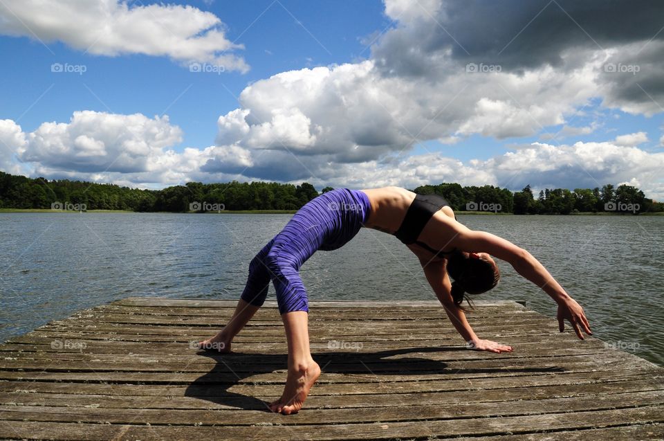 Morning yoga at the lake 