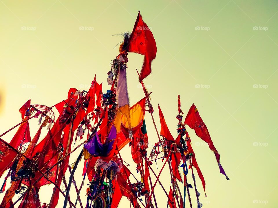 A colorful flags of the temple on a haze background