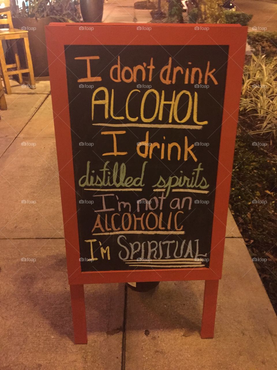 Spiritual . This is a fun sandwich board outside of a bar in Orlando.