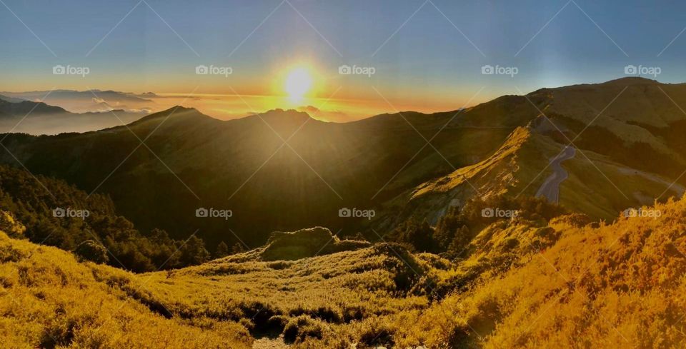 Beautiful mountain scenery with sun set