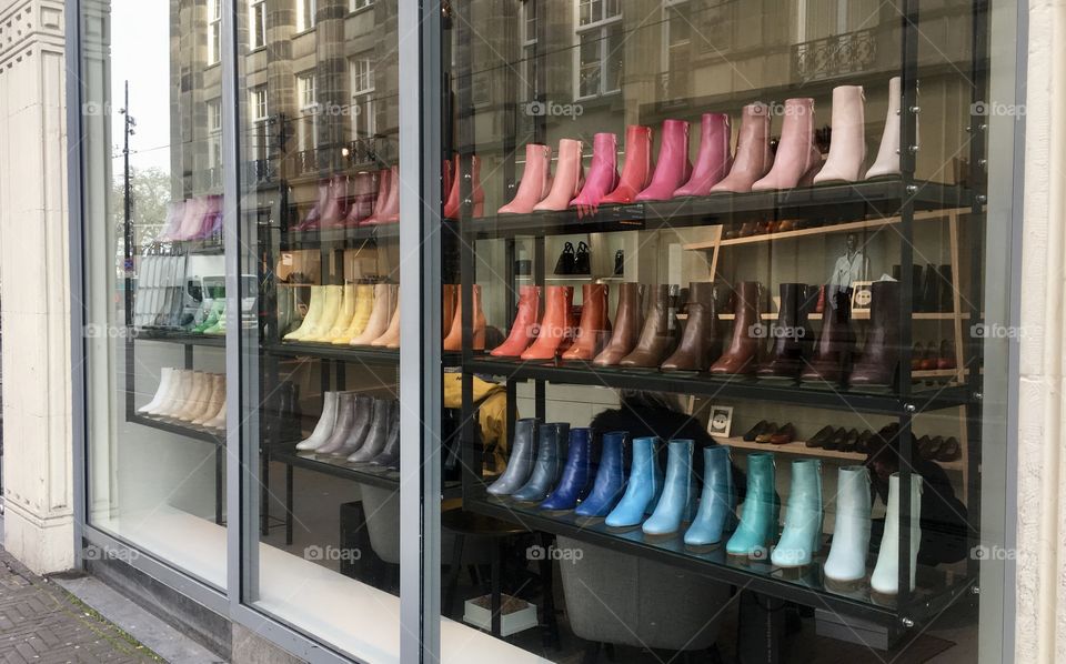 A colorful assortment of ankle boots in a Netherlands shoe shop