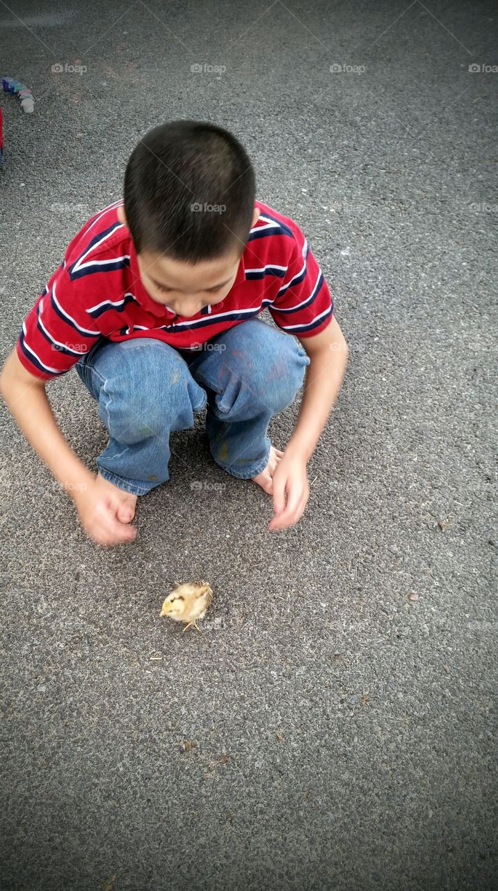 a boy and his peep. hanging with his new chick