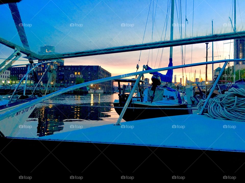 The sun has set over Newtown Creek in Long Island City, Queens, NY and the night is near. This picture was taken in the Spring of 2019. Hypnotic Productions