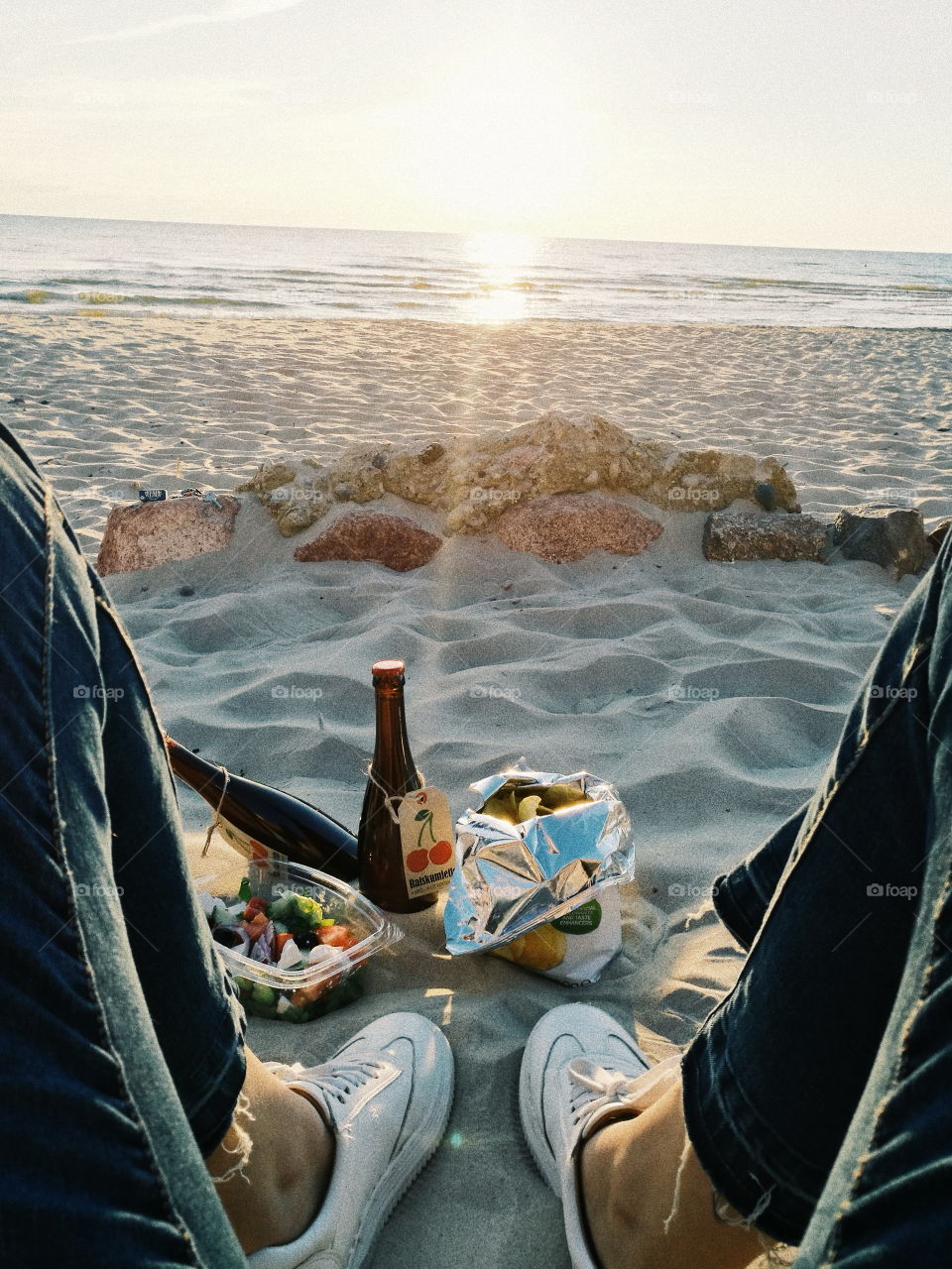 picnic at the beach while watching sunset