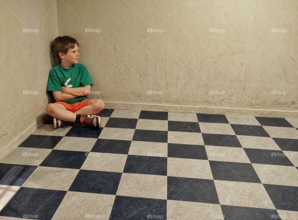 Lonely Child. Sitting In A Corner
