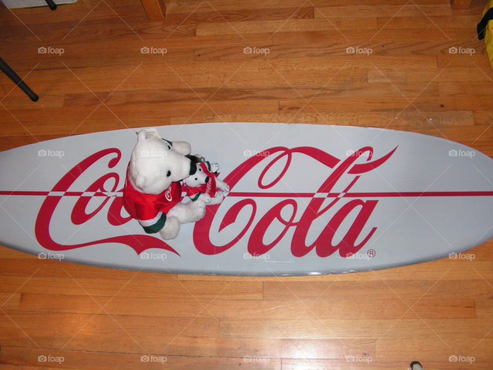 Coke-Cola bears on Coke surfboard