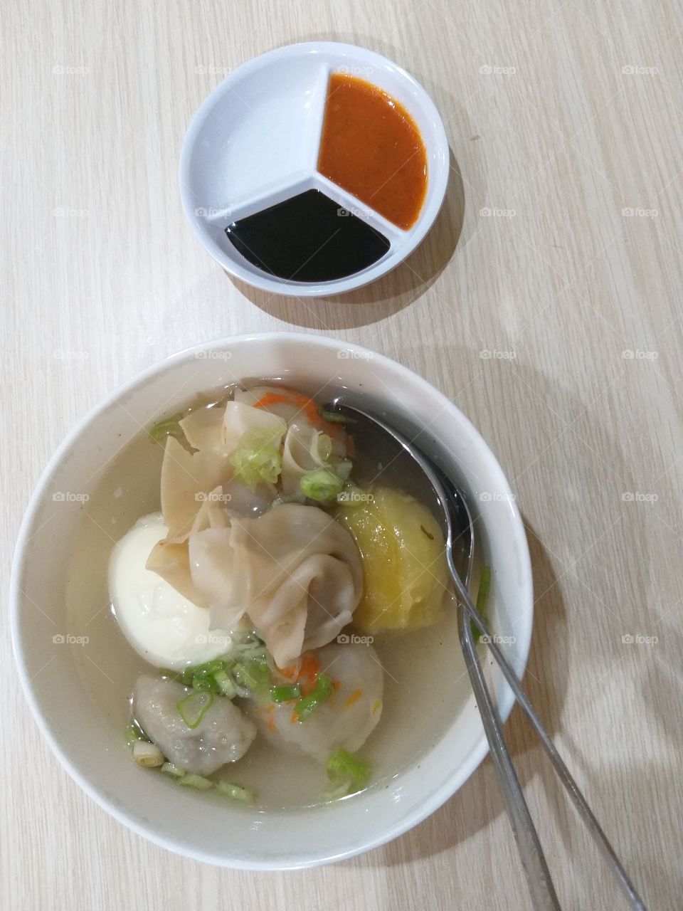 Ussually if you eat dumplings just with nut sauce, here you can eat siomay soup. The soup really delicious, better you eat in cold weather. The soup has a strong taste of pepper.