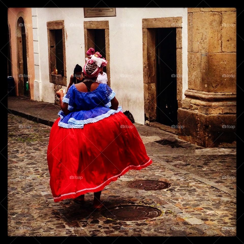 woman walking on the streets of Pelourinho, Salvador, Bahia