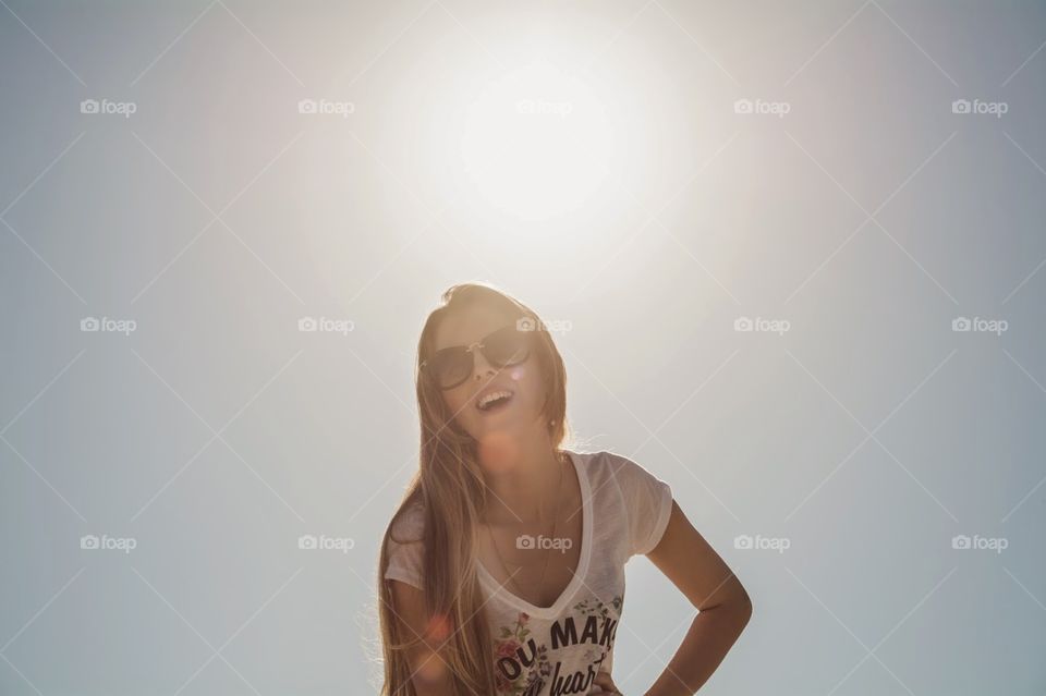 Blonde Woman Smiling Wearing Glasses