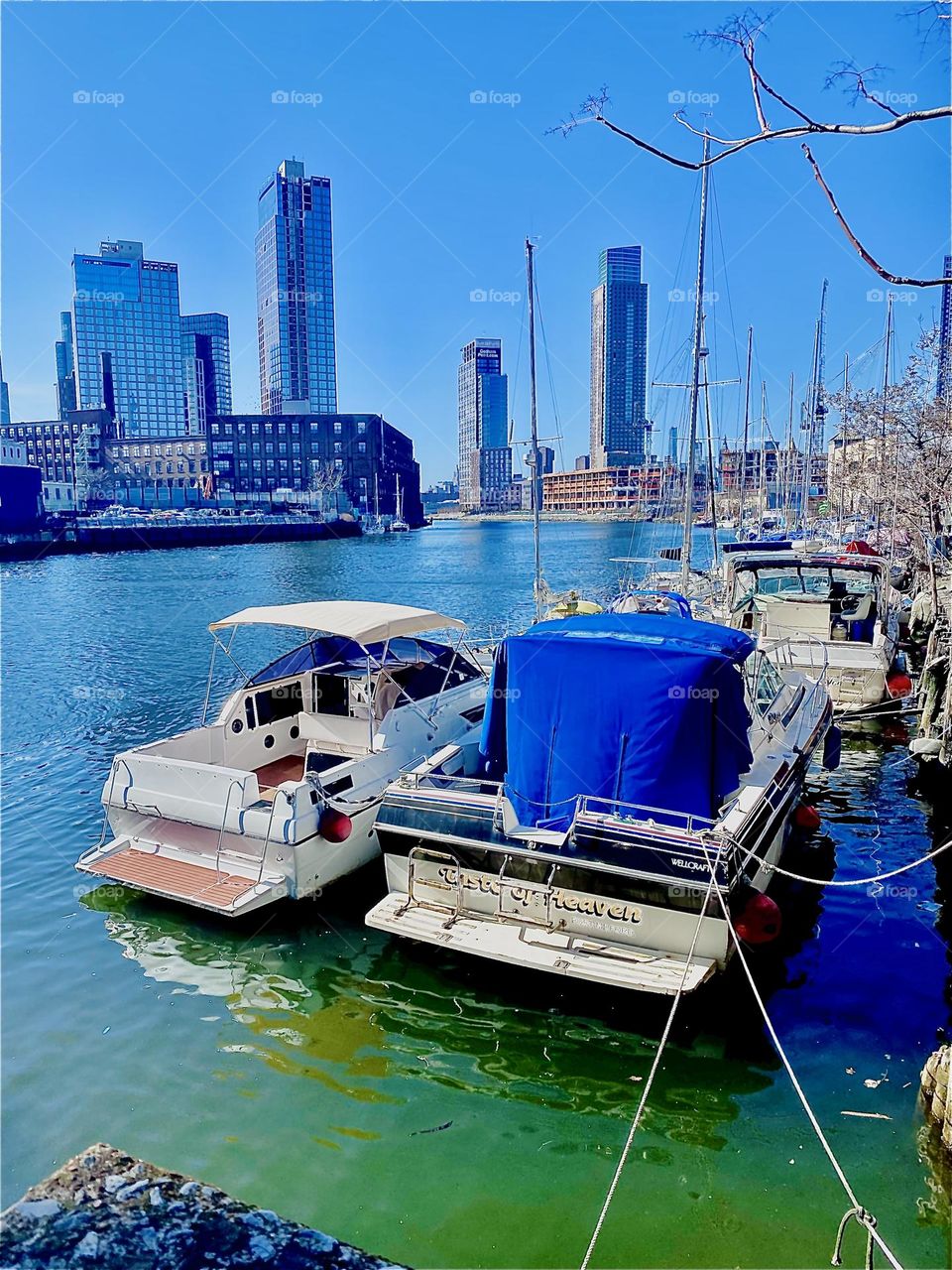 A beautiful view down “Newtown Creek” on a bright sunshiny day in February of 2023. To the left you see “Greenpoint”, Bklyn and straight ahead in the distance the LIC and further back the Manhattan skyline. Hypnotic Productions
