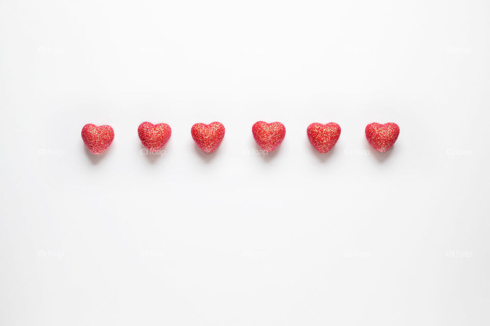 Red hearts on a white background. Valentine's Day.