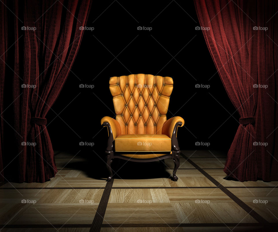 Just a classy chaise in a dark room with a spotlight.