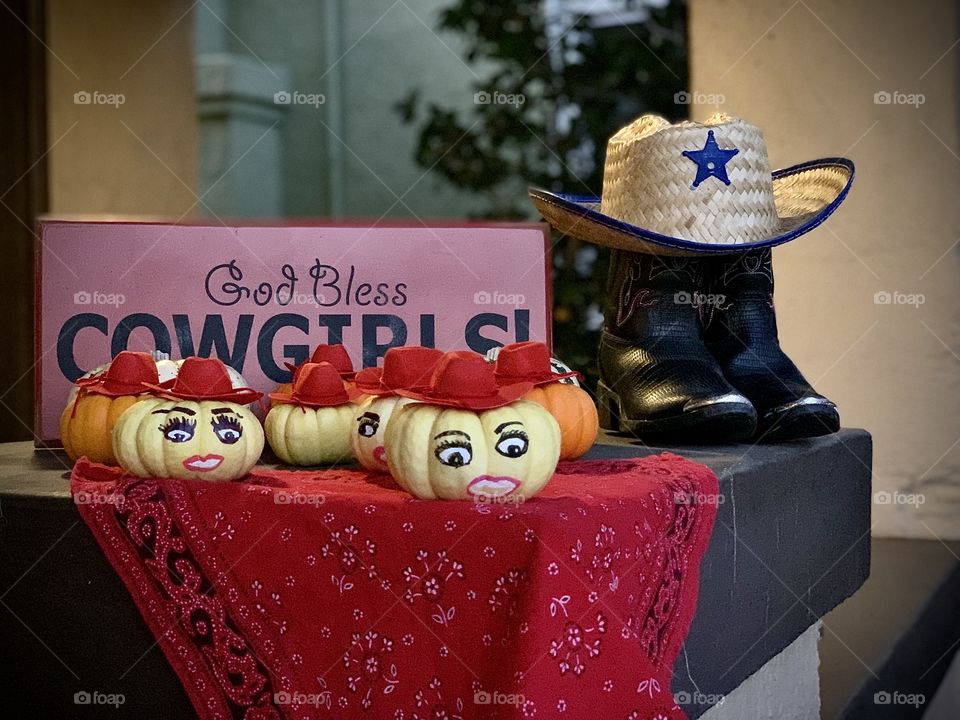 Pumpkins dressed as cowgirls 