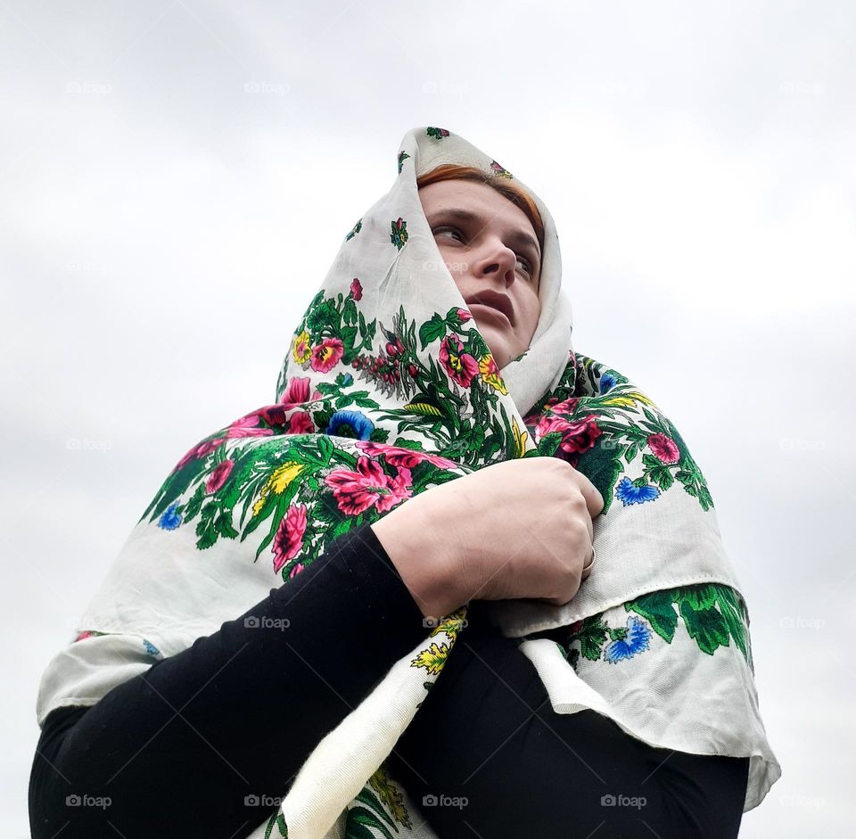 The reflection of war on the face of a Ukrainian woman