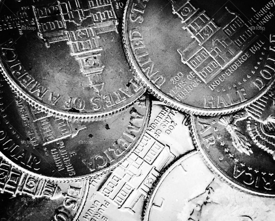 Half dollars. It's fun to keep a couple of these in your pocket to hand out to unsuspecting people. Paying with a half dollar tends to get a questioning smile.