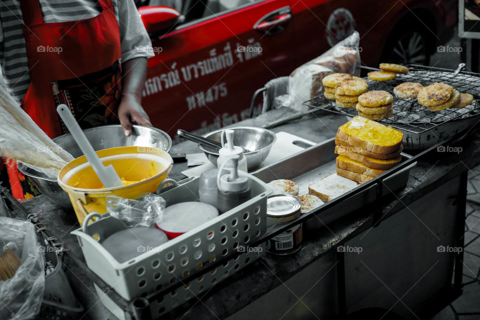 Bread with meat patties served in thr streets of Bangkok, Thailand