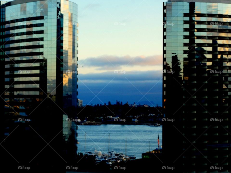 The bay ripples as the sun sparkles off the Two Towers in downtown San Diego.