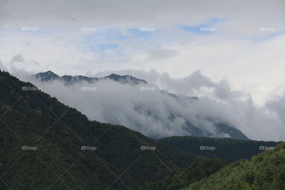 Clouds rolling over Himalayas
These are Dhauladhar mountain ranges of Himalayas in Himachal Pradesh in India.