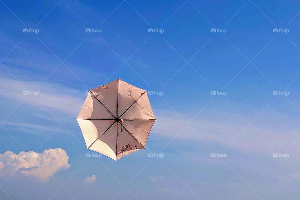 Umbrella in the sky