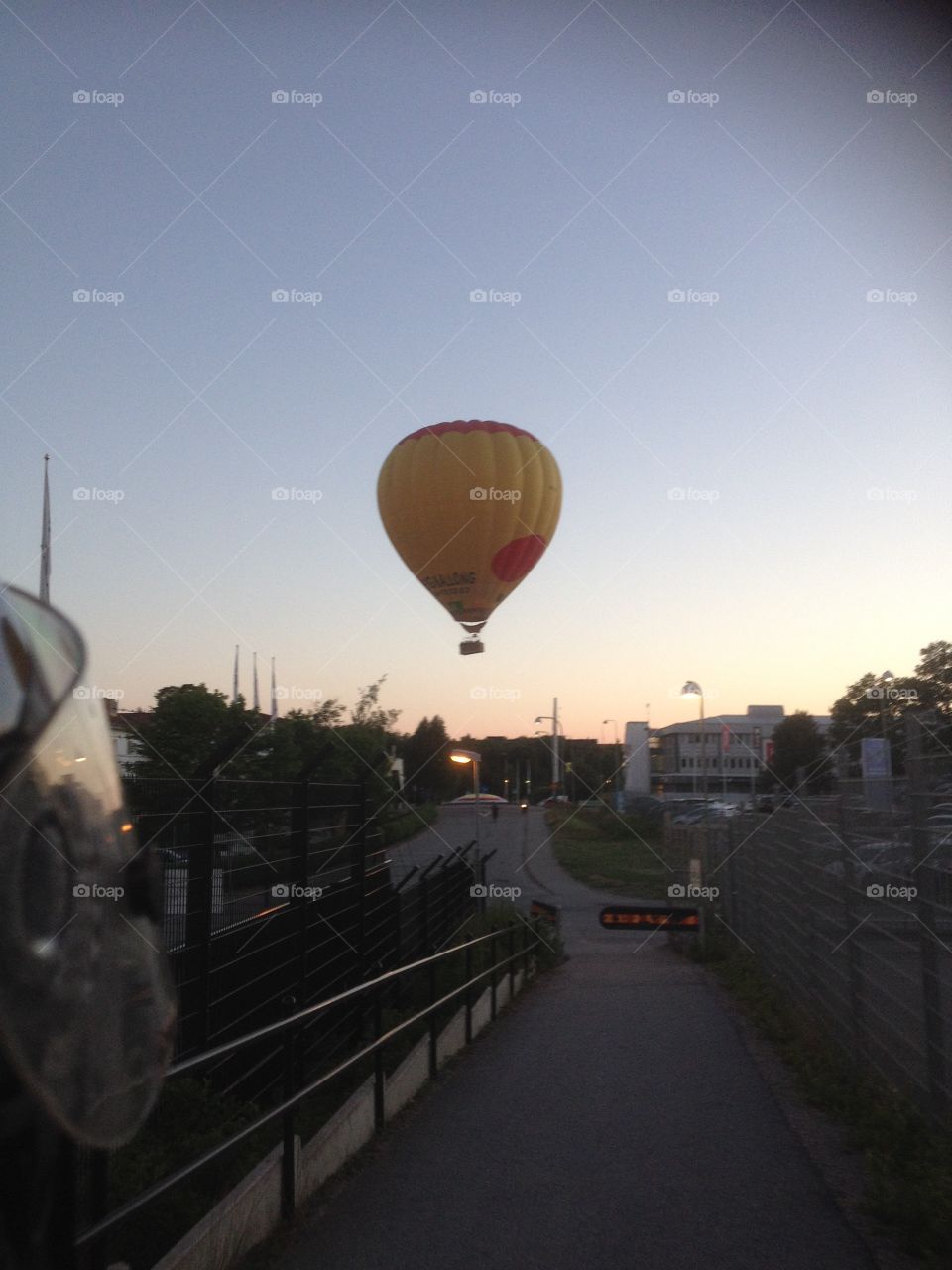 pic taken from a moped on a hot air ballon