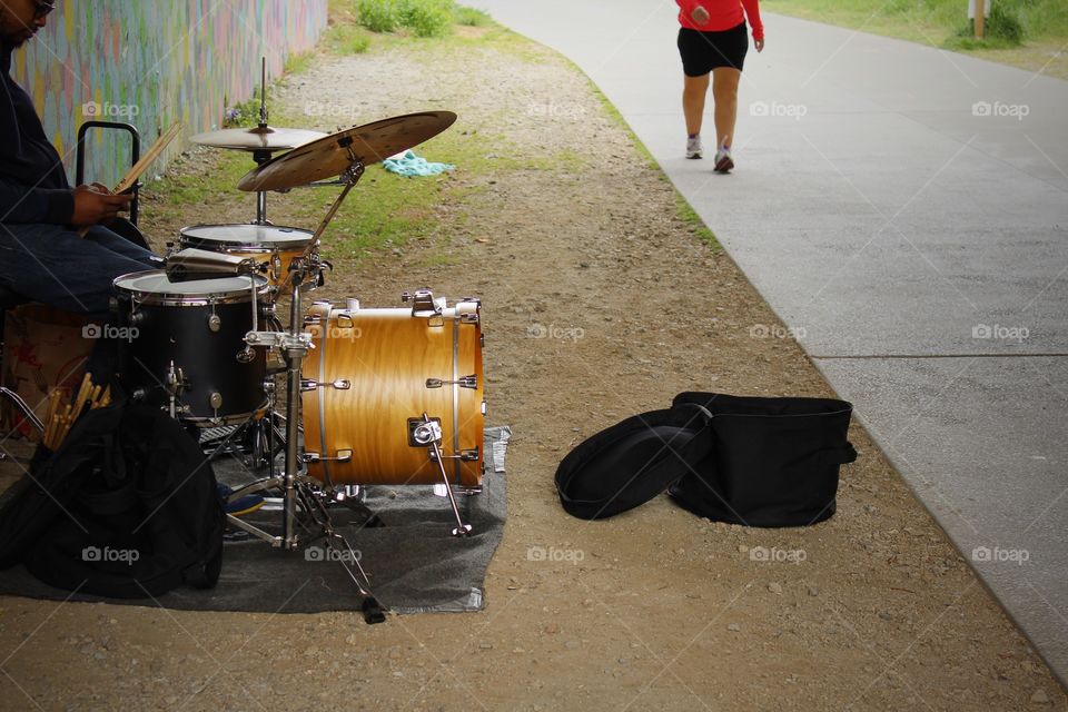 road side drummer performer preparing himself 