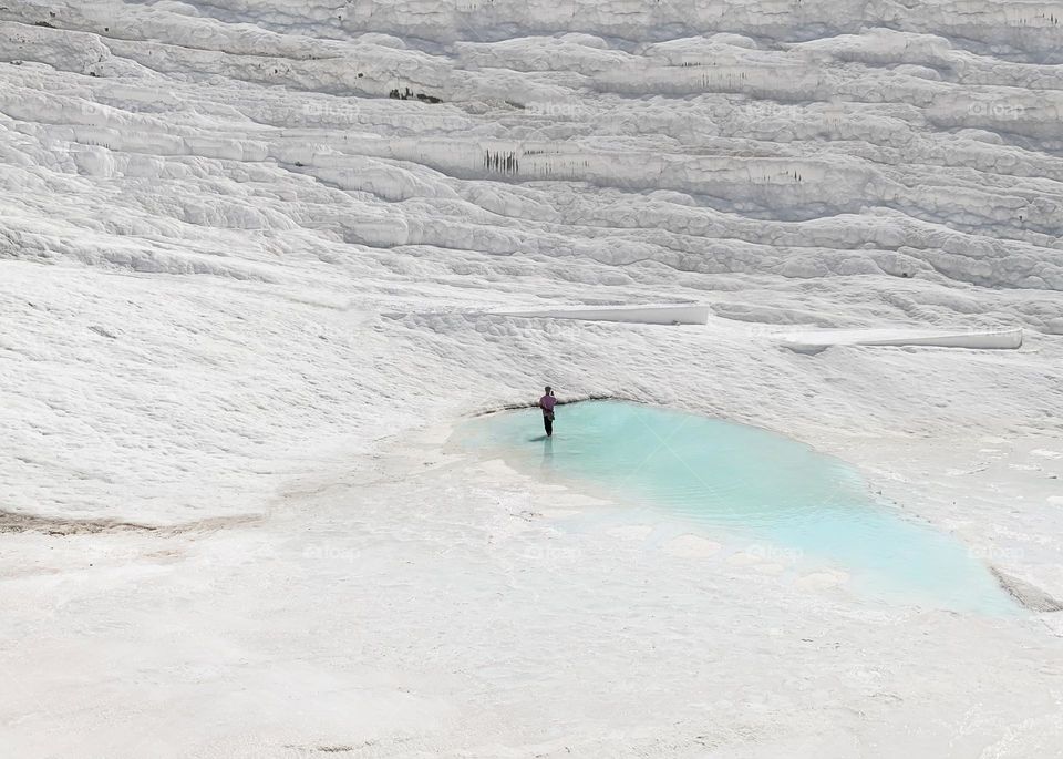 White landscape with blue lagoon 