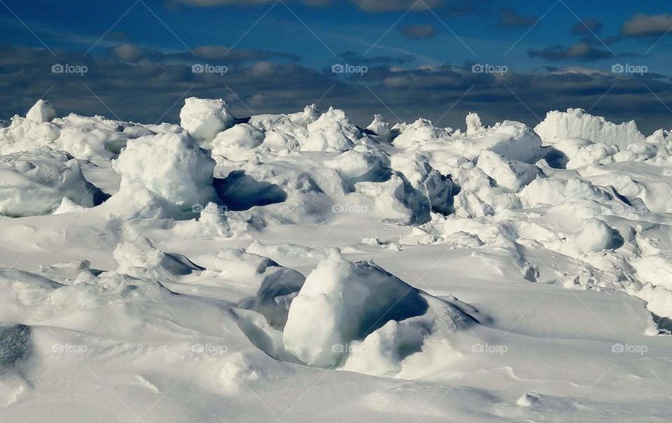the mighty winds of Lake Michigan turn our Great Lakes into ice caves and waves frozen in action. It is an incredible beauty of what cold, winds and waves can turn into