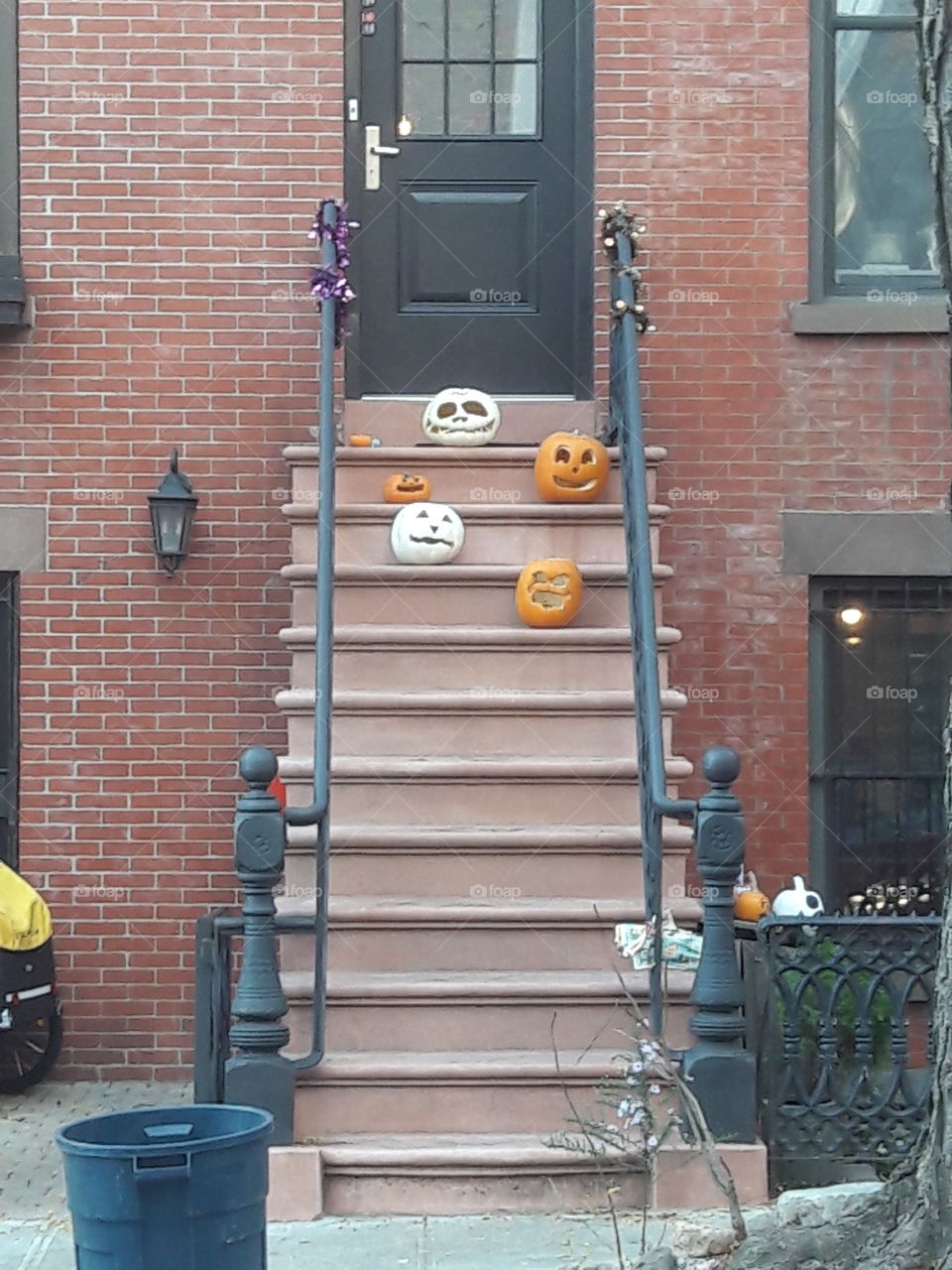 pumpkins on a stairway.