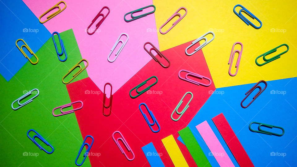Colorful origami paper and paper clip