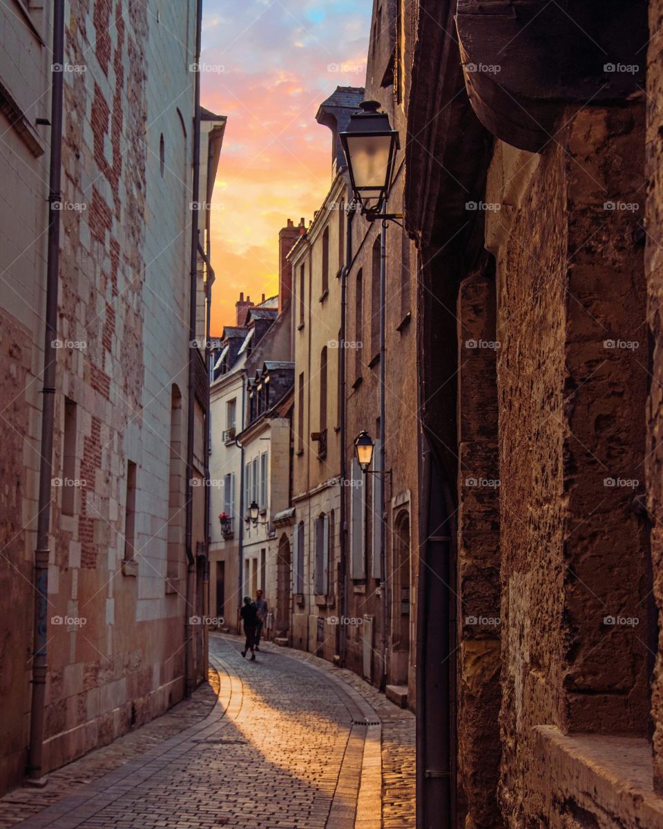 The streets of the beautiful city of Rennes, in France during the golden hour.
