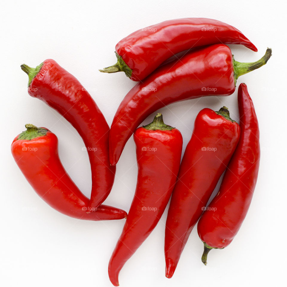 Red Peppers on a White Background 