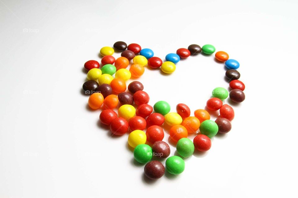 colorful love. love made from skittles candy