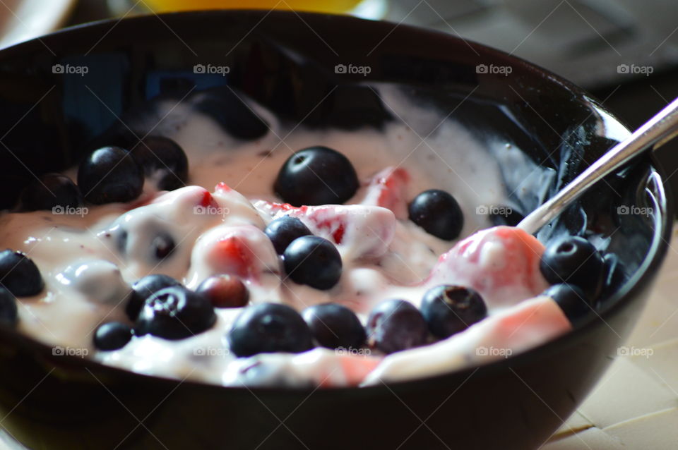 Yogurt and berries for breaskfast
