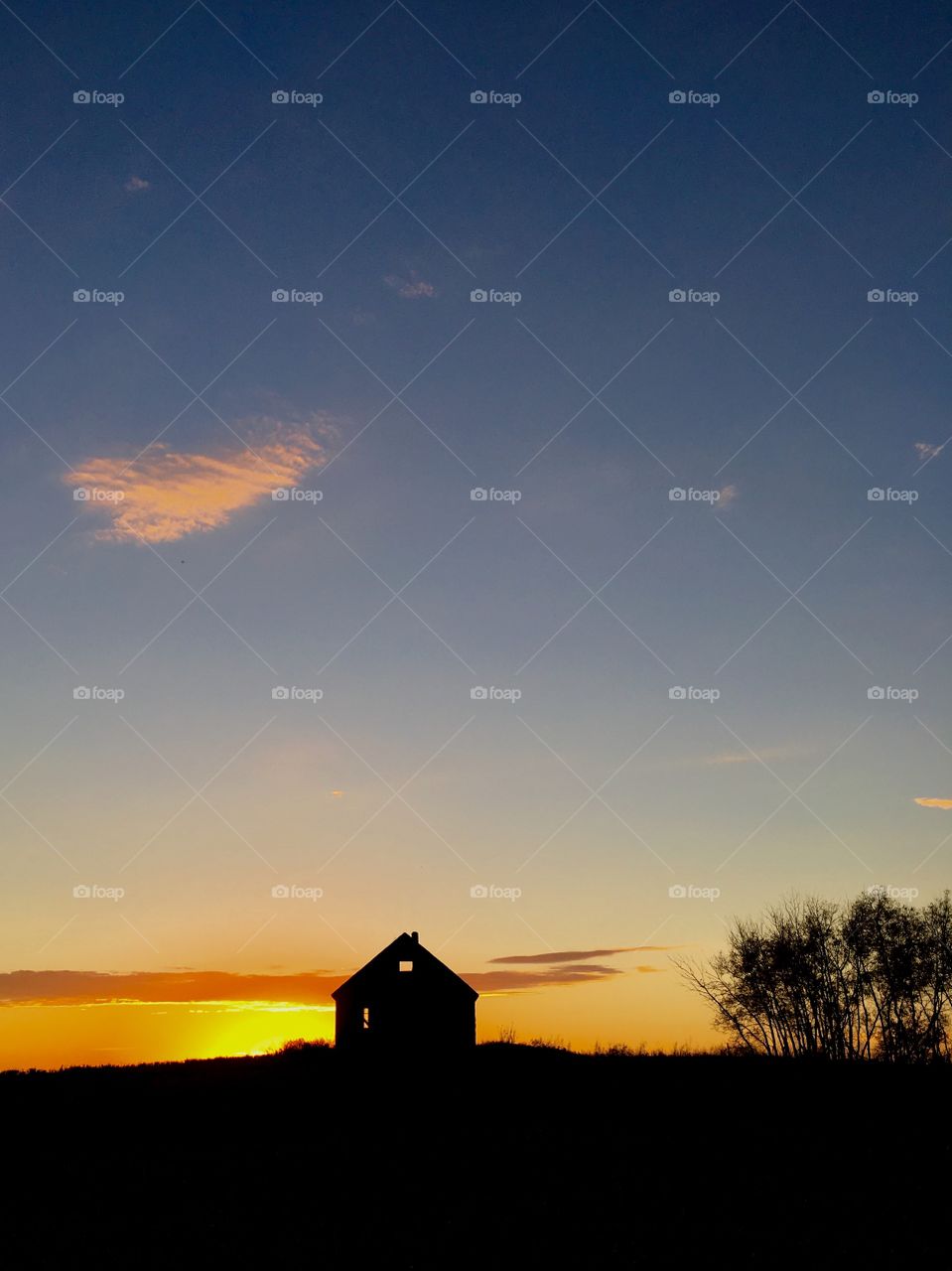 Abandoned house  in the sunset..