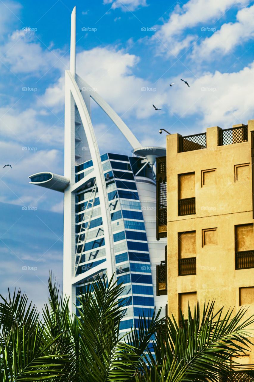 sail-shaped building against a clear sky