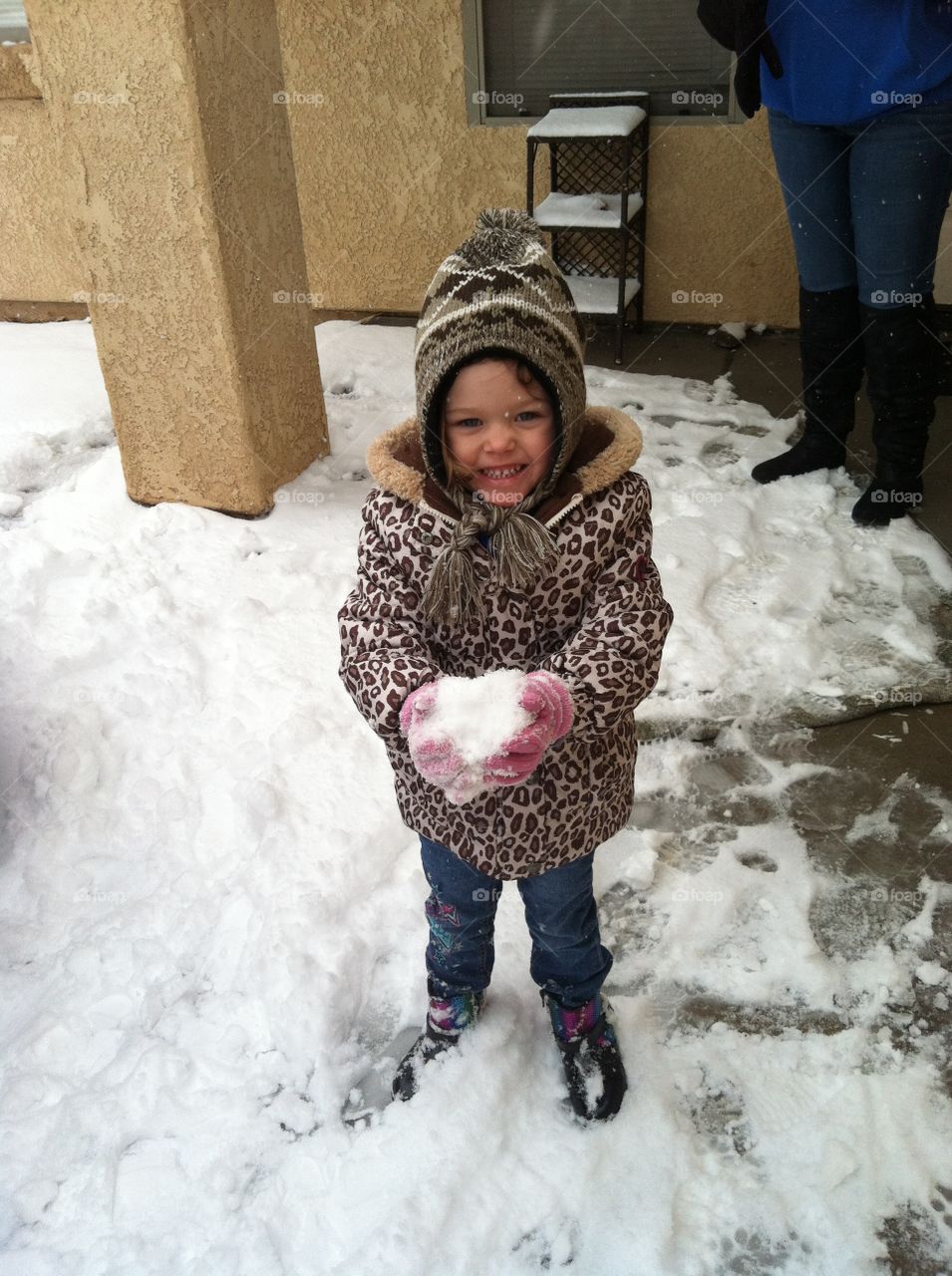 first snow. enjoying the first snow she ever experienced