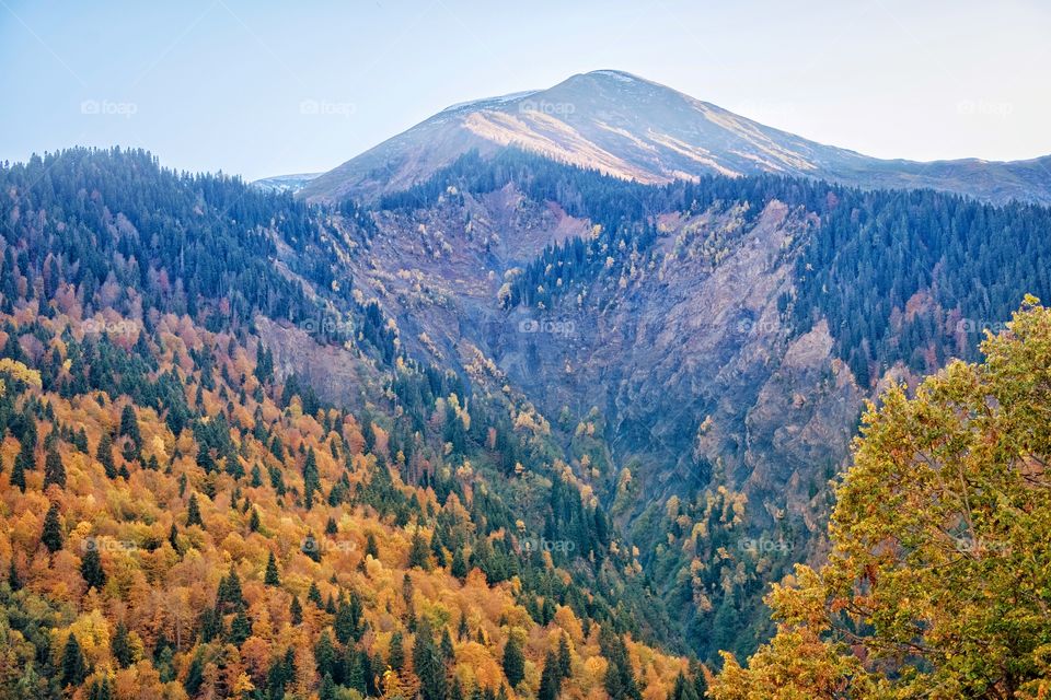 Colorful autumn scene of mountain scape along the way in Georgia 