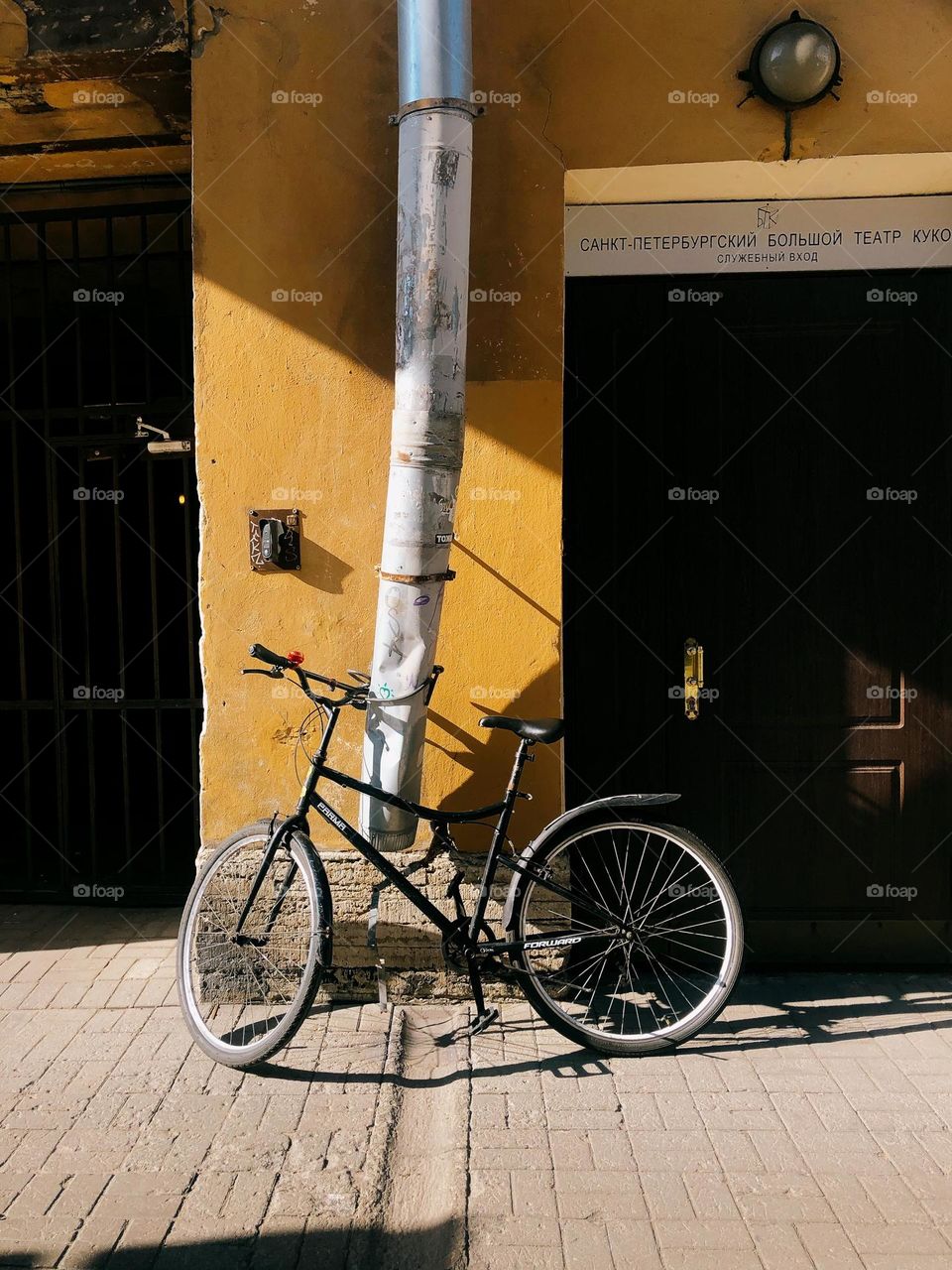 One lonely bicycle in sunny summer day 