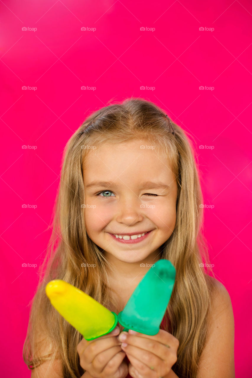 Cute girl with tasty ice-cream 