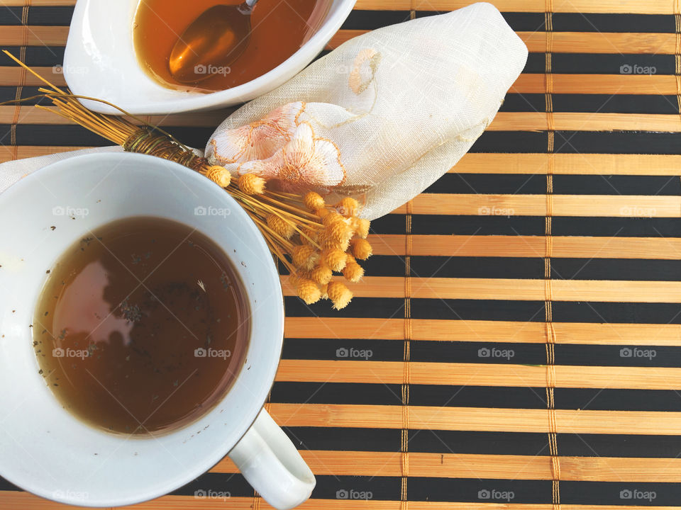 High angle view of herbal tea with honey