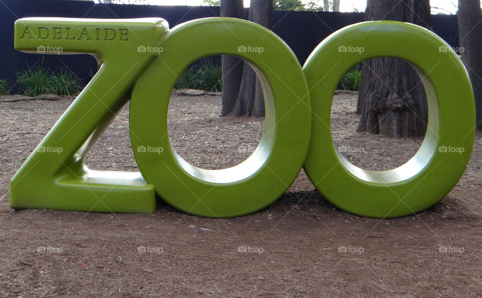 green sign sculpture zoo by kshapley