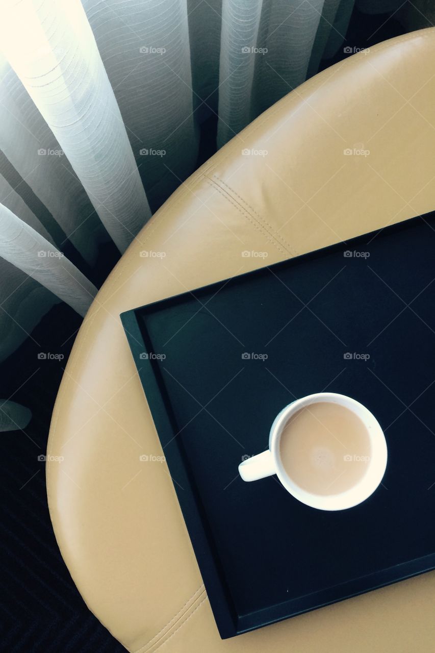 Sitting by the window can be a little cold in December. But the exposure to natural light and a nice warm drink makes for good winter medicine.