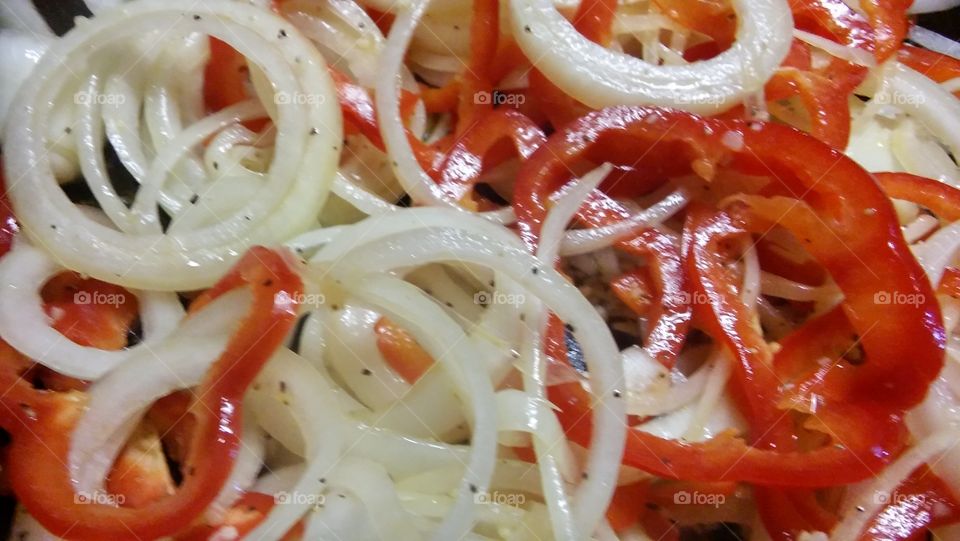 Red bell peppers and onions