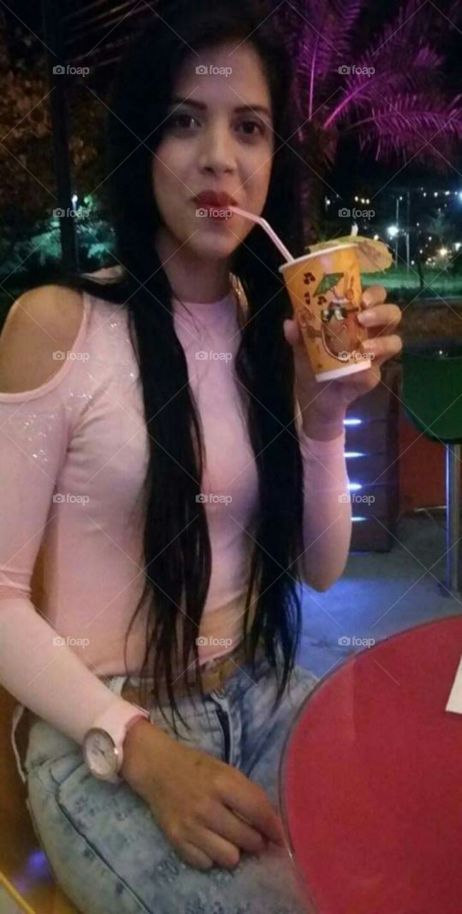 cute girl drinking cocktail