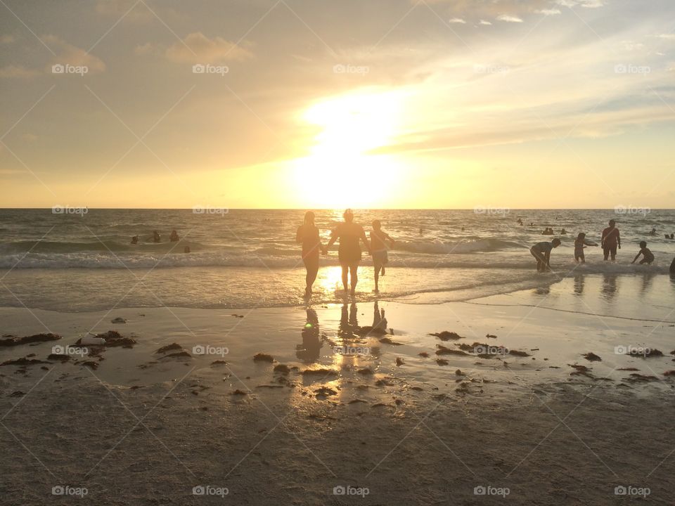 Family together at the beach 