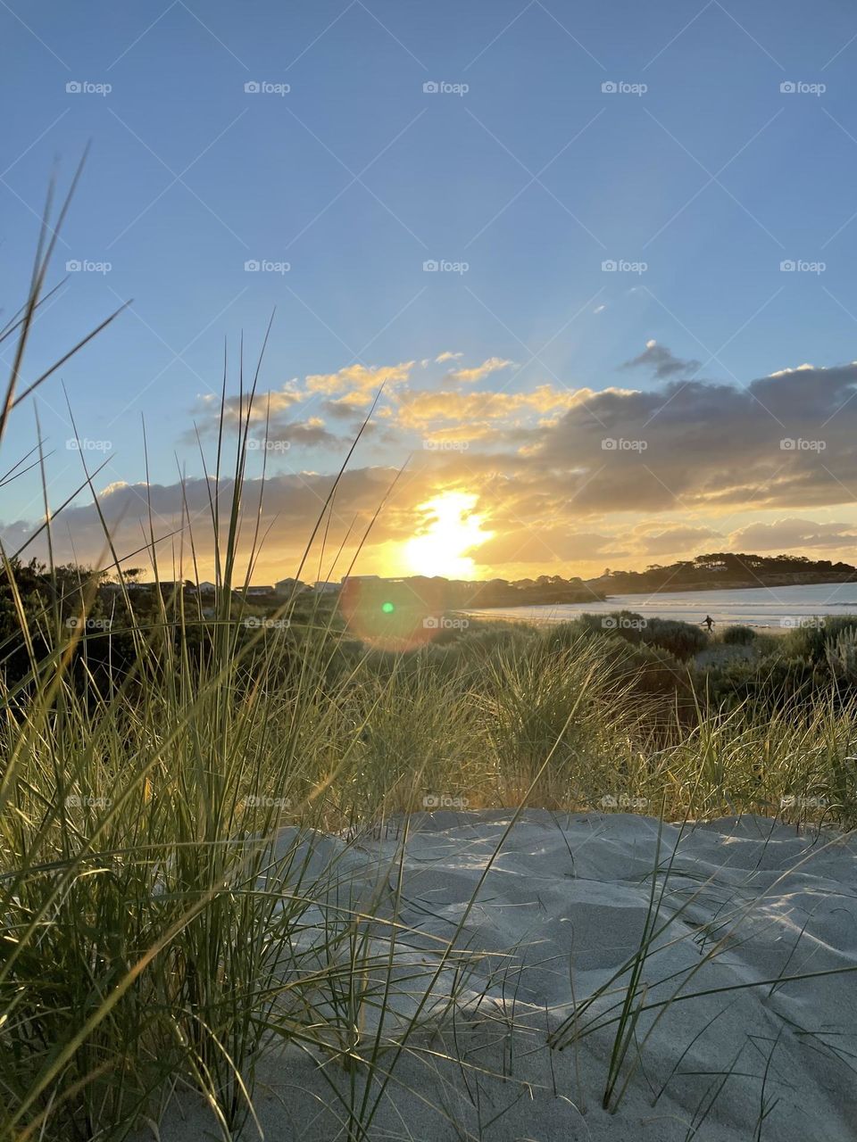 Sun gleaming onto sand 