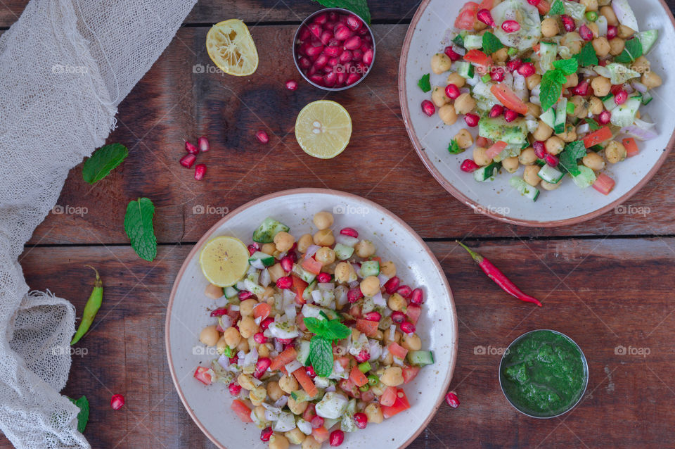 Healthy snack, garbanzo chickpeas , chole chaat is a Indian snack made with chickpeas and various other spices. Green chutney and tamarind chutney is added to make it spicy and tangy 