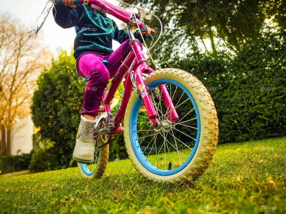 kids on bikes close-up of girl on her bike